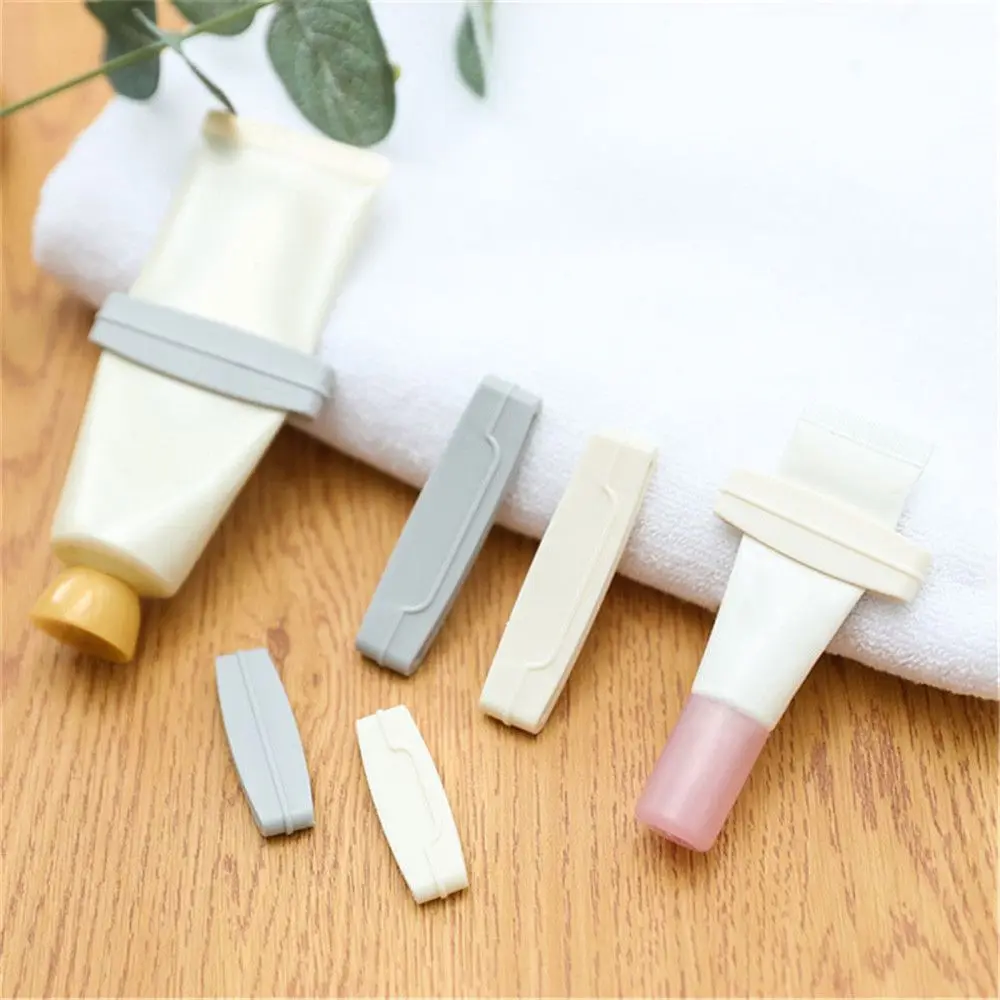 

Home Holder Stand Bathroom Supply Manual Toothpaste Squeezer Toothbrush Holder Cosmetics Cleanser Extruder Rolling Tube