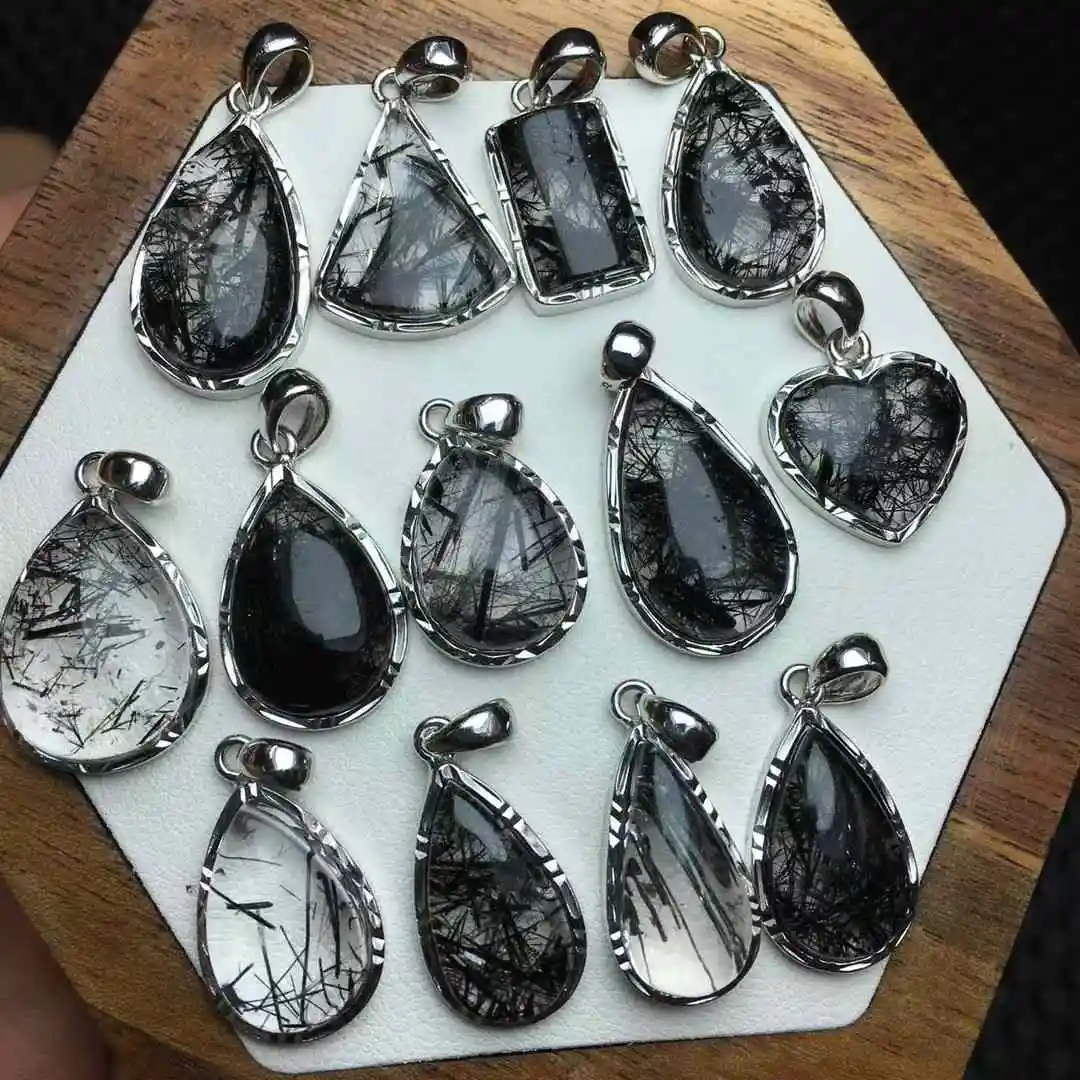 Цельный кулон из серебра 925 пробы с натуральными черными рутилированными