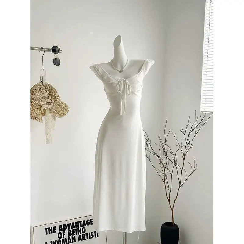 Однотонное нежное платье на бретелях с открытой спиной женское летнее средней и