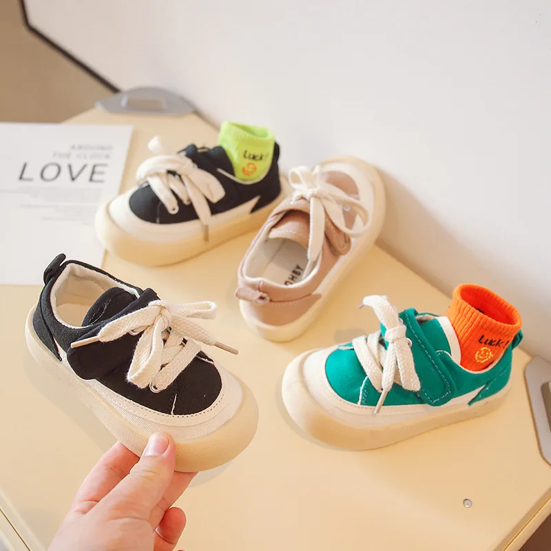

Spring new children's shoes boys and girls Korean version canvas shoes casual children's shoes big toe shoes