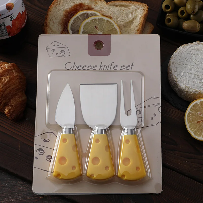 

Yellow Cheese Handle Knife Fork and Spade Three Piece Set of Stainless Steel Cheese Knife Set
