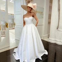 simple a line wedding dress with pockets satin spaghetti strapless elegant bridal gowns sweep train beach backless bride dresses