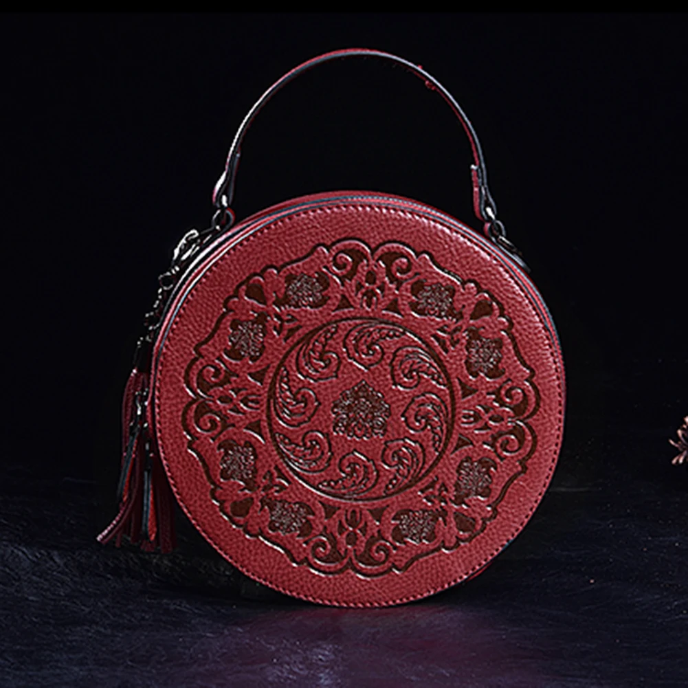 

Женская круглая Сумка-тоут из натуральной кожи, с кисточкой