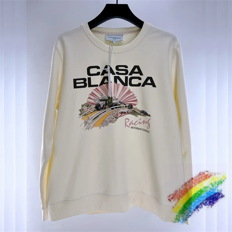 

Свитшот унисекс абрикосового цвета с круглым вырезом и принтом