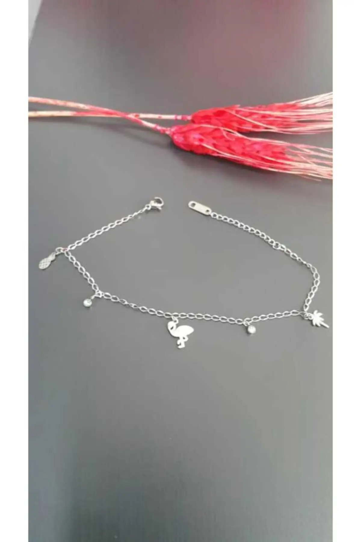 

Silver Figure Dangle Steel Bangle