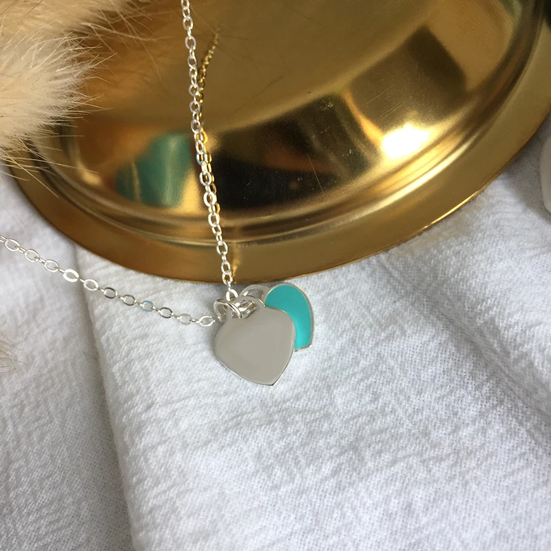 

Ожерелье женское из серебра 925 пробы с голубым сердцем