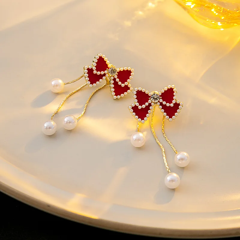 

Red Bow Tie Silver Needle Earrings 2023 New Fashion Long Style Tassel Imitation Pearl Earrings for Women
