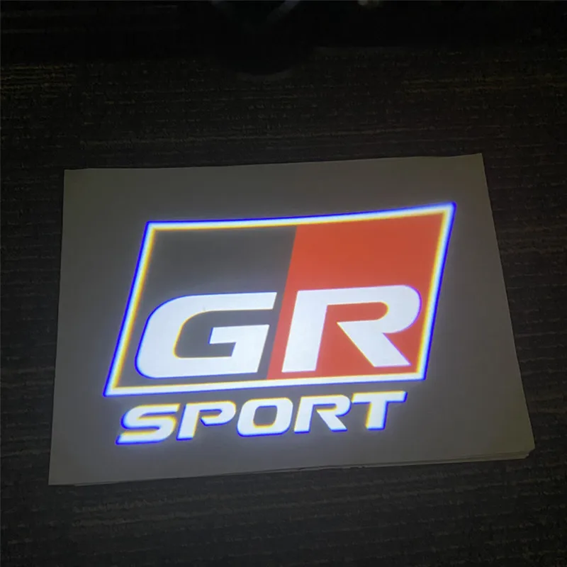 

Led Wireless Car Door Welcome Laser Projector GR SPORT Logo Ghost Shadow Night Light For Toyota YARIS Sports COROLLA REIZ CROWN