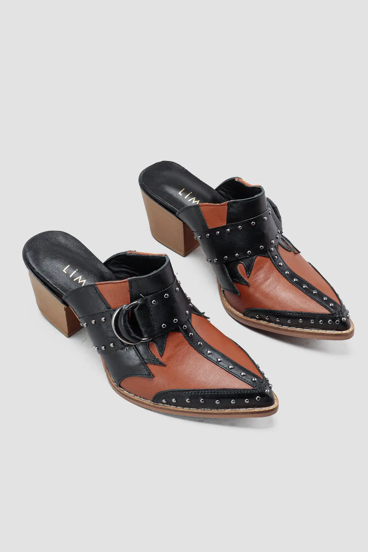 

Genuine Leather Jody Tan Pointed toe Stapler Detailed Heels Slippers