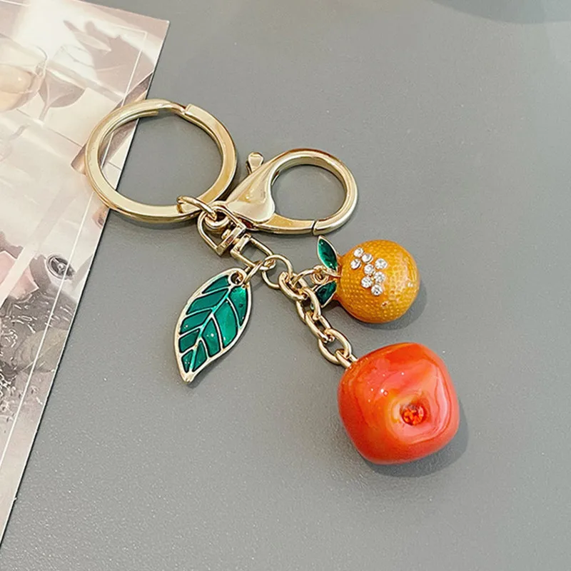 

2023 New Good Luck Keychains Cute Alloy Persimmon Keyrings Women Purse Charm Pendant Creative Key Chains Car Key Ring Holder
