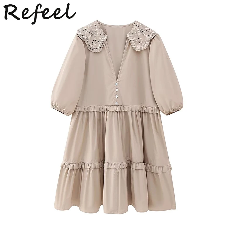 

Женское свободное мини-платье с V-образным вырезом и вышивкой