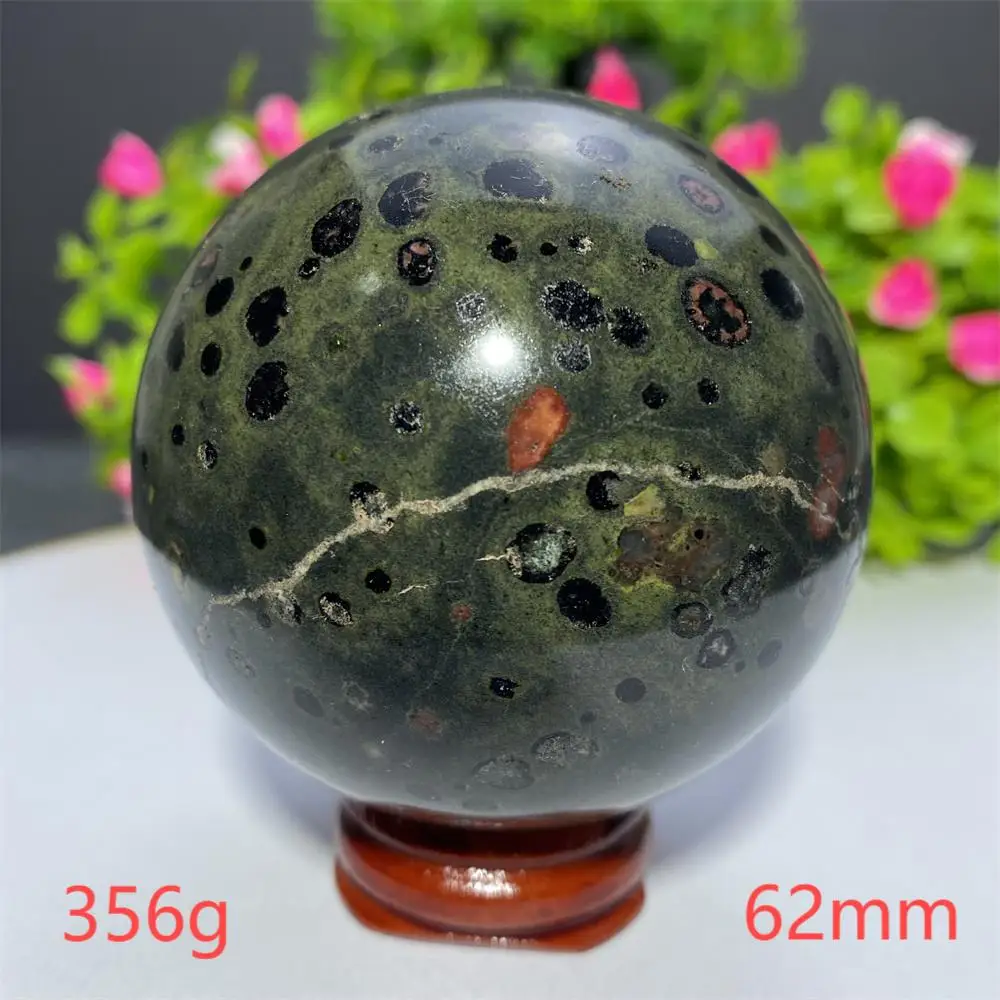 

Каменный шар из яшмы сливы
