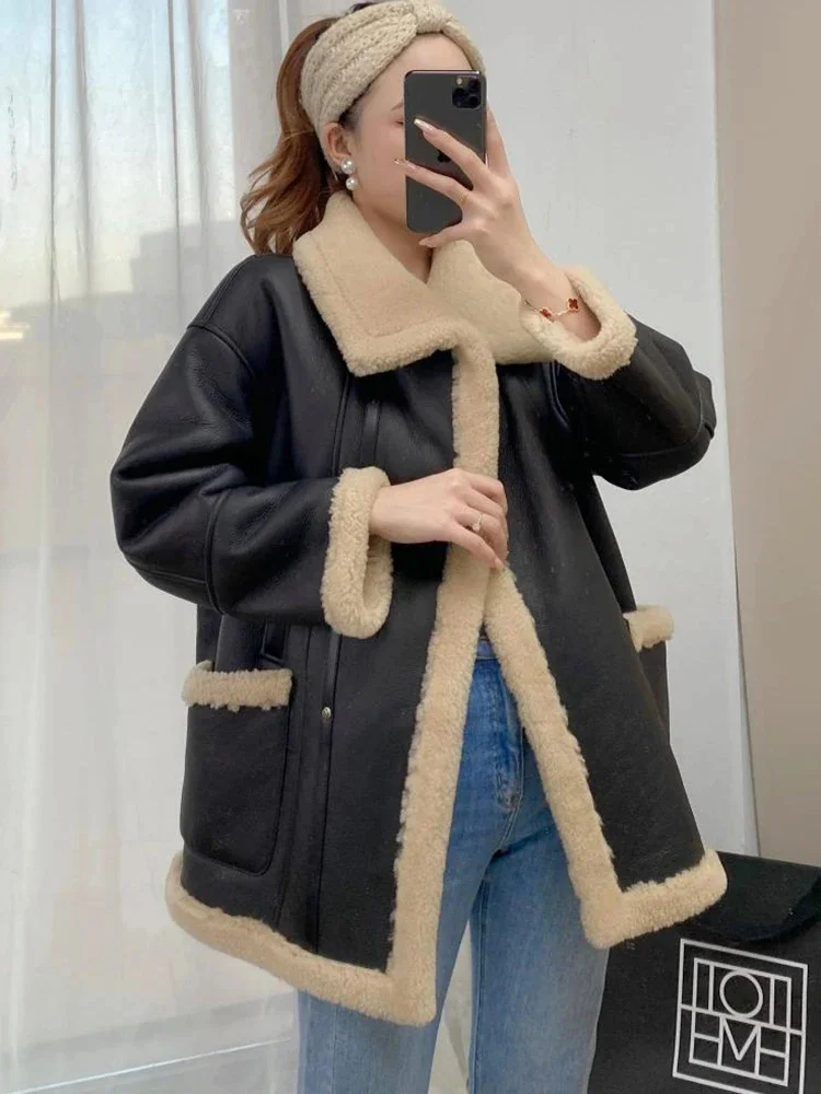 Женская зимняя куртка из овечьей шерсти натуральной черной кожи
