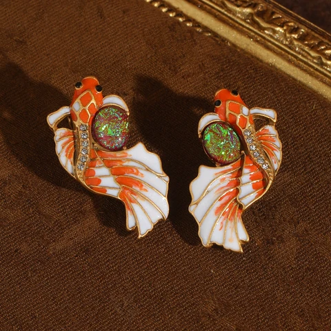 Сережки-гвоздики STALAIT с красным опалом