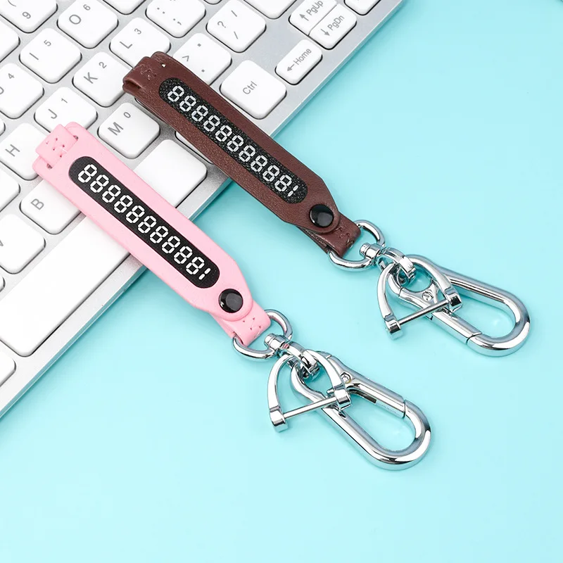 Anti loss phone number woven leather key chain 360 degree rotary horseshoe metal key chain for men and women car key chain acces