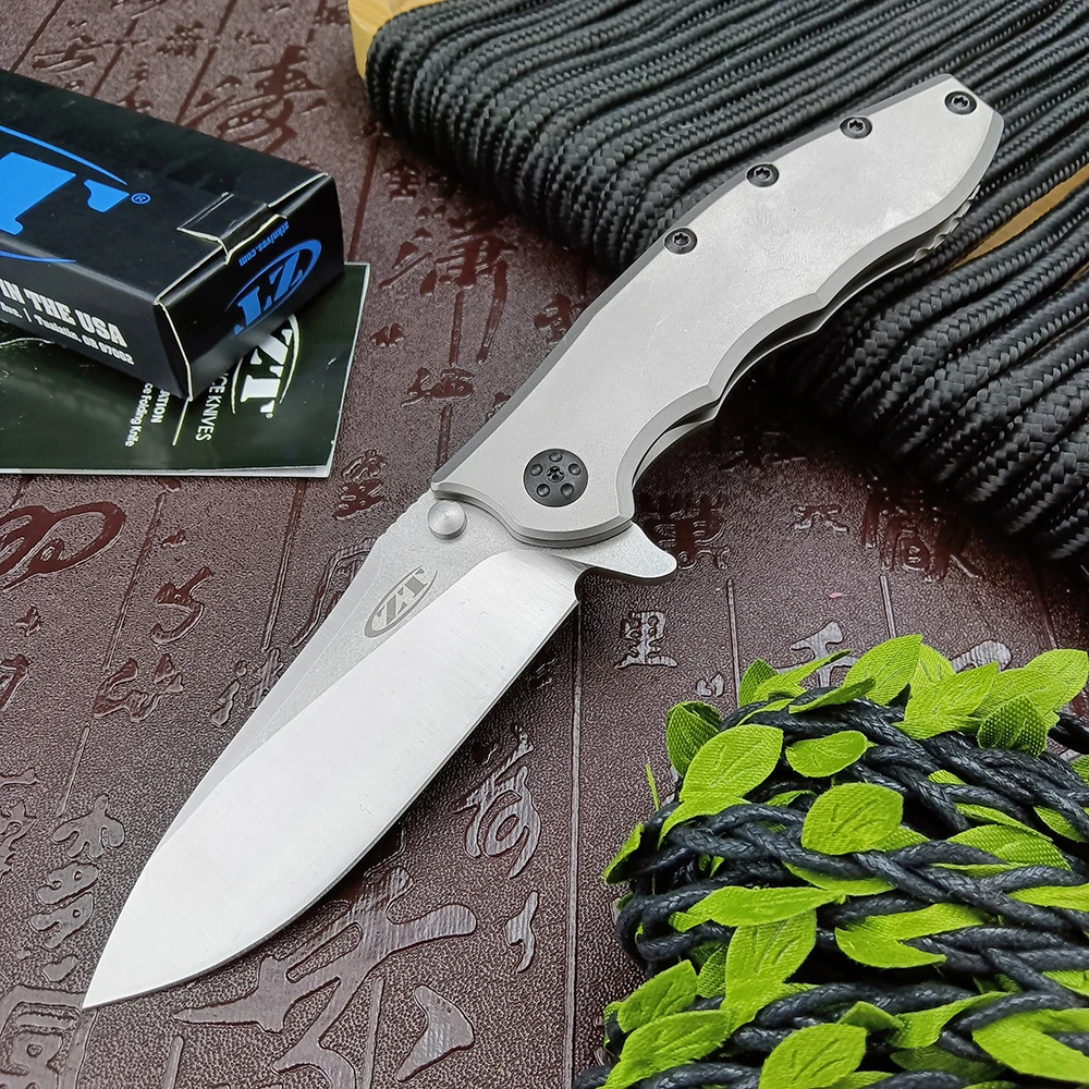 

Zero Tolerance 0562TI Hinderer Flipper Knife Tactical Self Defense Folding D2 Stonewashed Plain Blade Knife Titanium Handles EDC