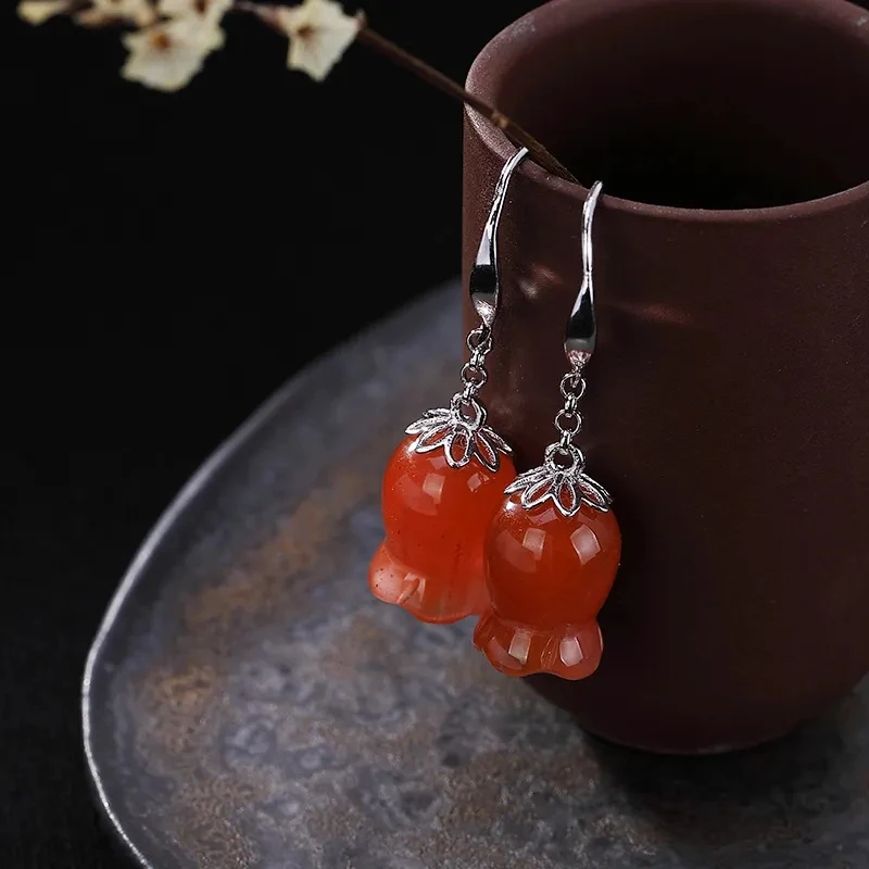 

Original new natural southern carnelian magnolia flower earrings Chinese style retro fresh palace style ladies jewelry