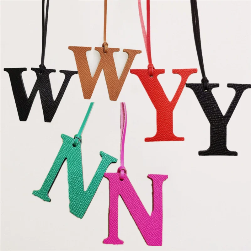 

Wholesale Luxury Genuine Natural Leather Y W N Initial Capital English Letter Keychain Backpack Pendant Ladies Women Bag Charm