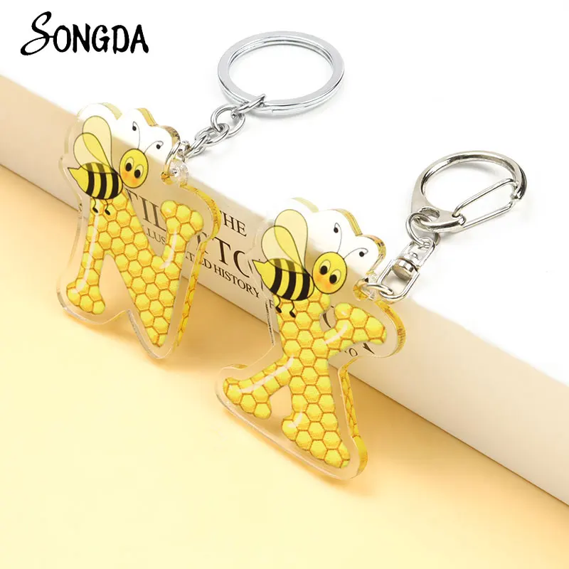

Cartoon Cute Bee 26 English Initial Letters Acrylic Keychain Funny Honeycomb Alphabet Key Chains Backpack Car Bag Key Accessory