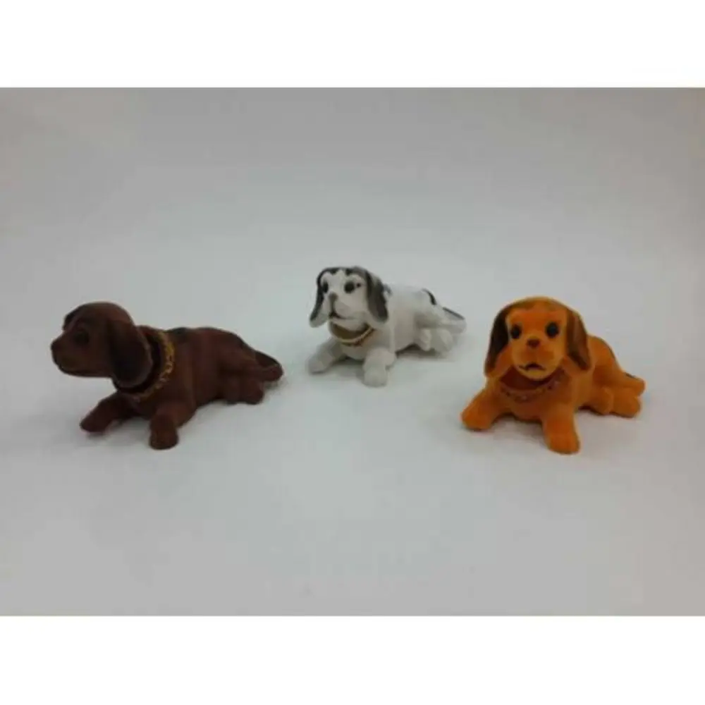 

Head Nodding Dog Trinket