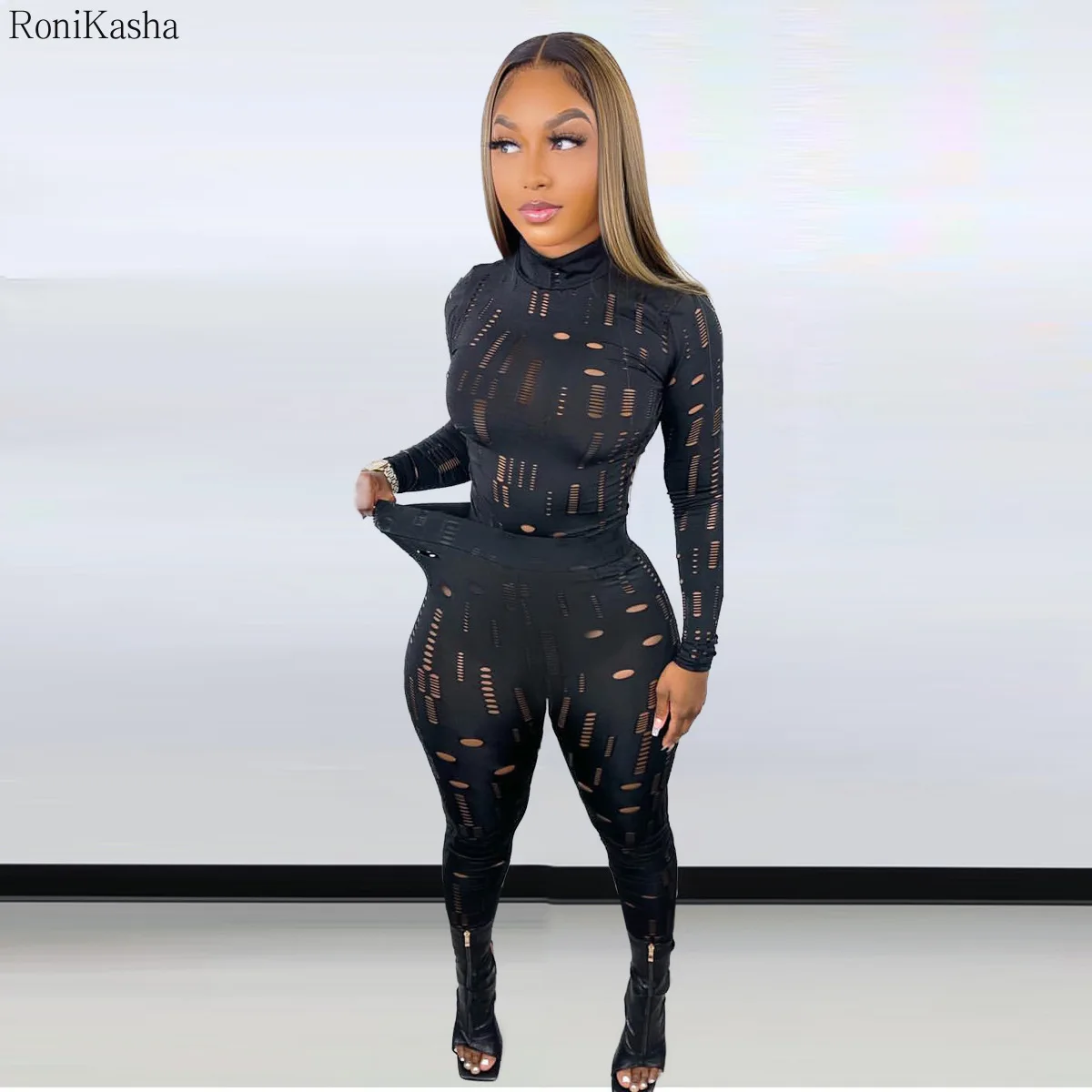 

Женский спортивный костюм из двух предметов, модный трендовый сексуальный комплект с дырками и длинными рукавами и брюки-карандаш, спортив...