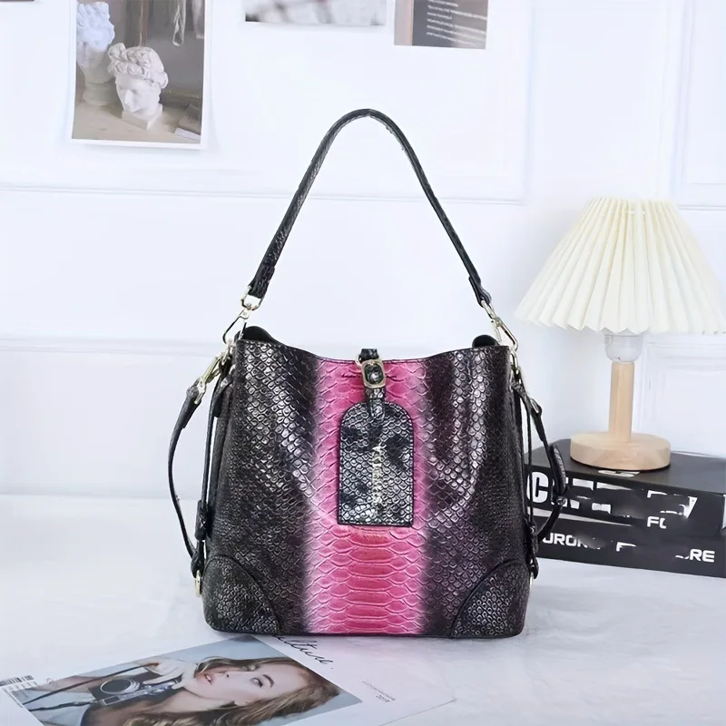 

Genuine leather high-end snake patterned bucket bag for women's new light luxury portable one shoulder crossbody bag