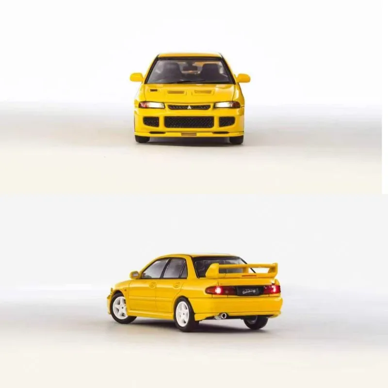 Фото Модель автомобиля Whelart 1:64 Mitsubishi Lancer EVO3 из литого сплава, игрушка-подарок для мальчиков на праздник, предмет коллекционирования и декоративный элемент для взрослых. №3
