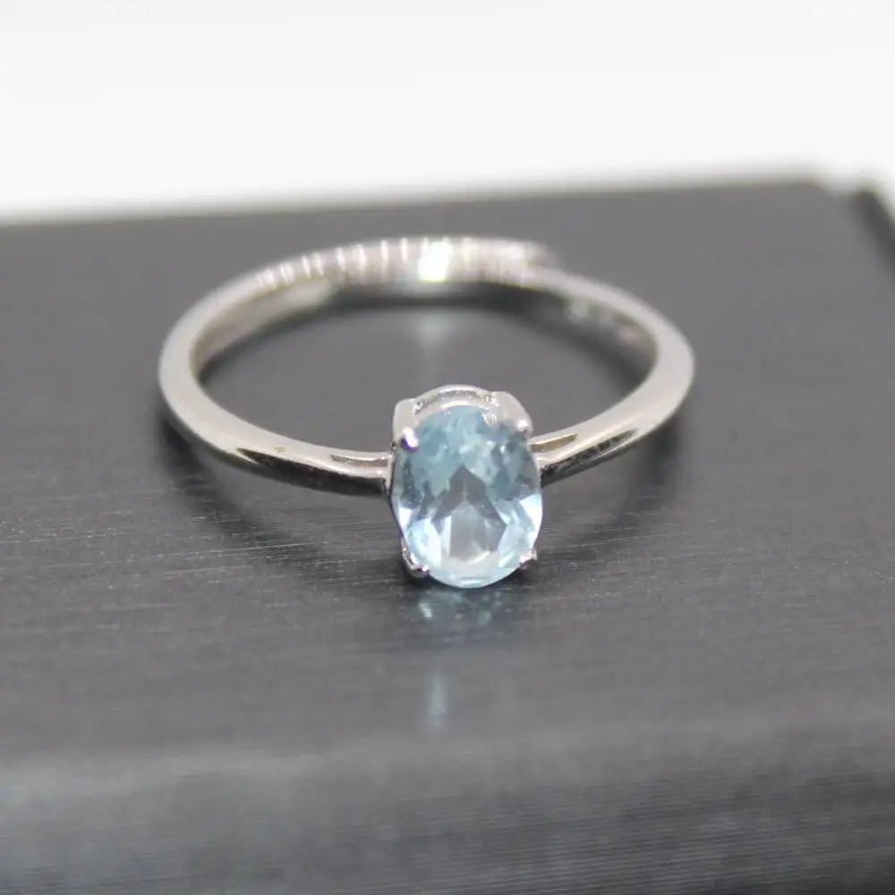 

Регулируемое кольцо AKAC из серебра с натуральным голубым топазом, приблизительно 5 х7 мм, отправляется случайным образом
