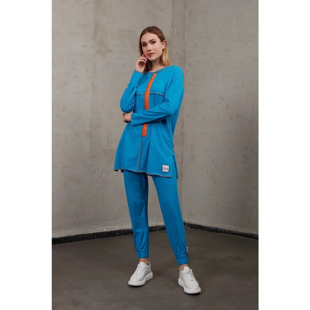 

Dorlie Mavi S-19183 Dorlie летний хлопковый однотонный трикотажный костюм на молнии с длинными брюками-туника