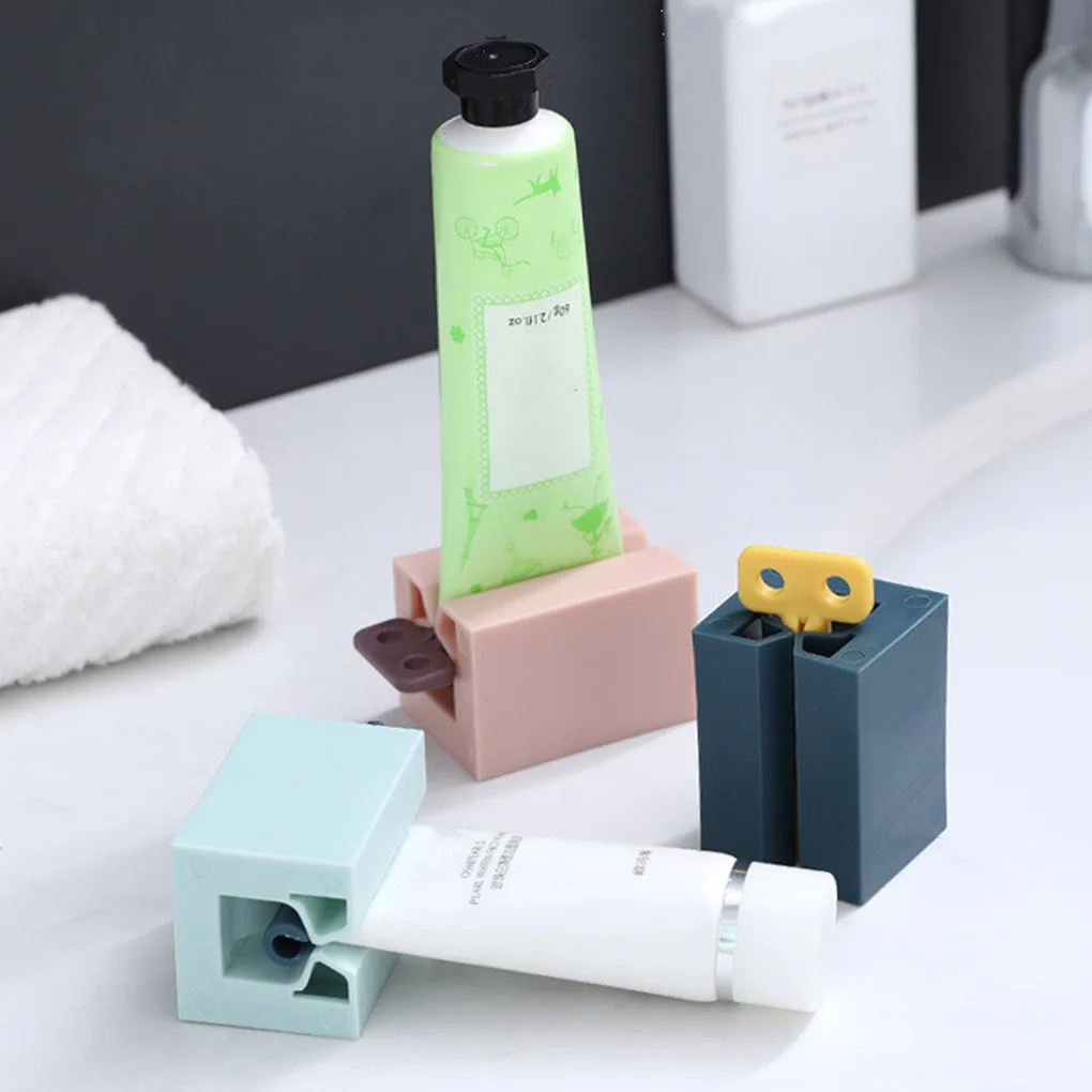 

Multifunctional Manual Toothpaste Squeezer Bathroom Presser Squeezer Facial Cleanser Press Rolling Holder New