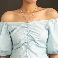 wholesale fashion niche design necklace for women 2021 new simple short pearl autumn winter sweater accessories