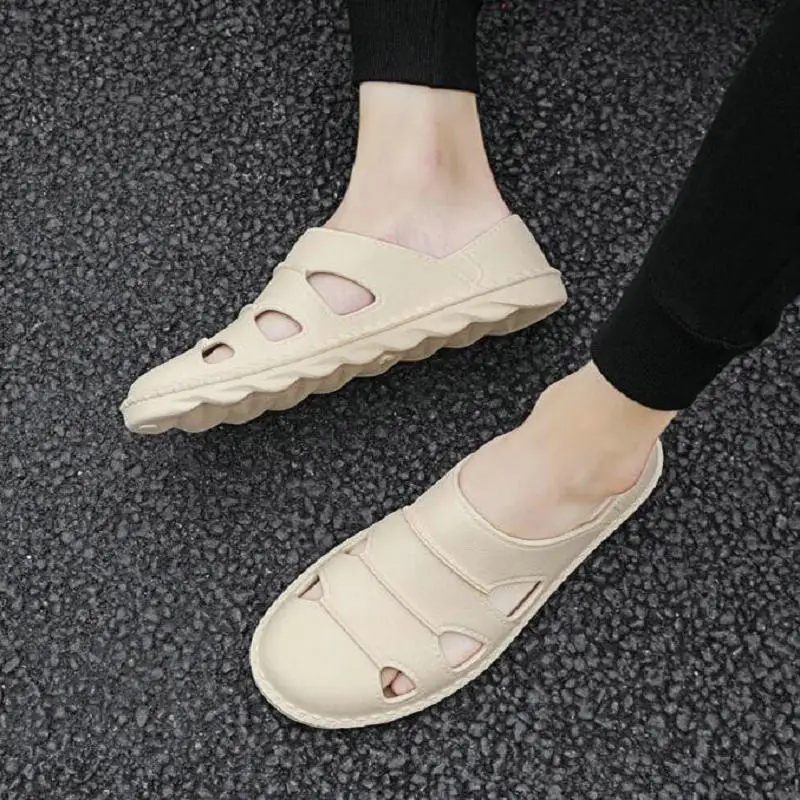 Driving shoes men's summer Baotou soft bottom sandals and slippers Year's new deodorant leather sandals men's casual beach shoes