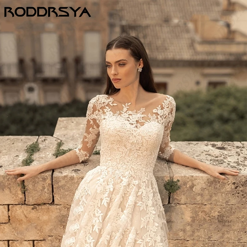 

RODDRSYA 3/4 Sleeve Wedding Dress for Woman Romantic Tulle Scoop-Neck Bridal Gown Simple A-line Illusion Button Back Bride Party