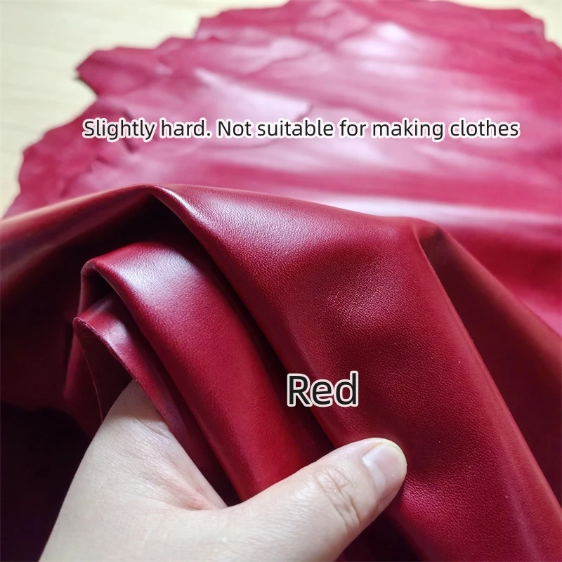 Красная овчина толщиной 0 8 мм. Кожа первого слоя. Натуральная кожаная ткань.