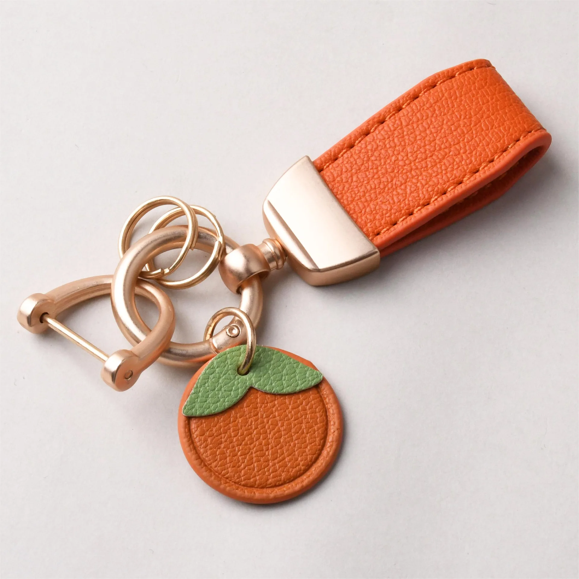 

Модный брелок, металлический короткий кожаный цветок, автомобильный брелок, кулон, разделенный брелок, женский брелок, аксессуары