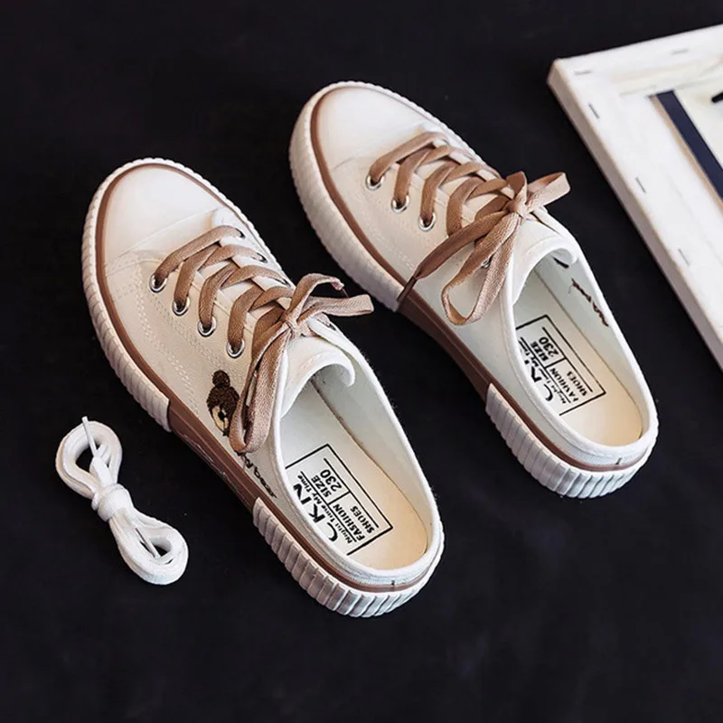 

Vulcanized sneakers women 2021 new fashion low top half slippers canvas shoes slip on flat casual shoes comfortable loafer