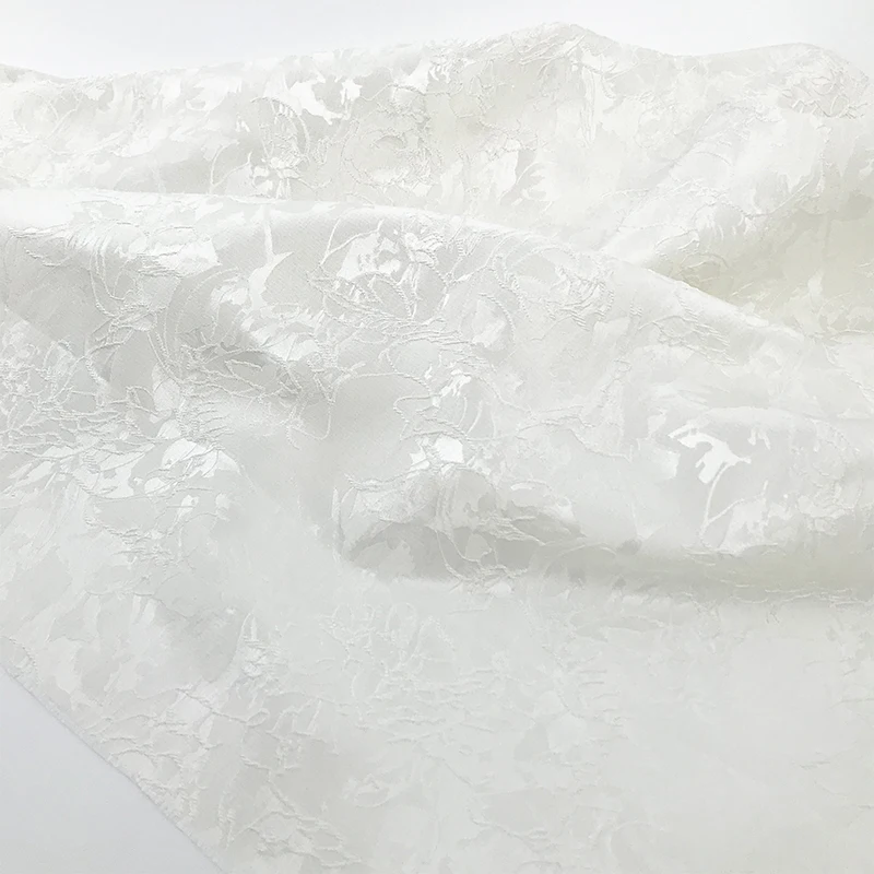 

White Glossy Flower Polyester Jacquard Fabric 160cm Wide - Sold By The Meter