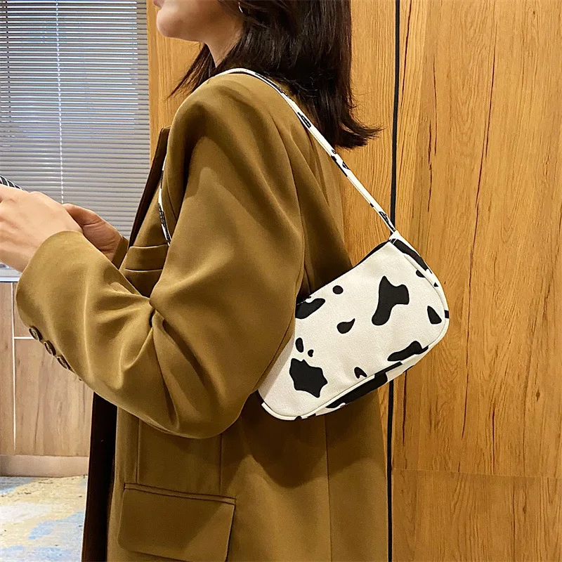 

Lovely Cow Canvas Bag Female Bag New Trend Fashion Single Shoulder Leisure Armpit Small Square Bag