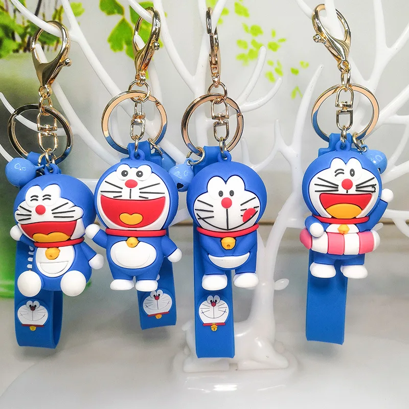 

Creative Couple Car Bag Pendant Doll Gift Wholesale Keychain Charms Anime Cartoon Cute Doraemon Jingle Cat Keychain