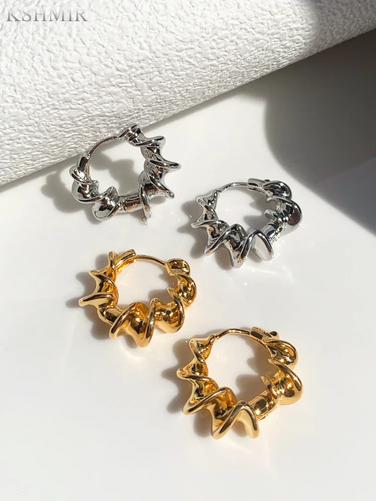 

Twisted circle temperament cold style simple design circle earrings Korean delicate temperament earrings female