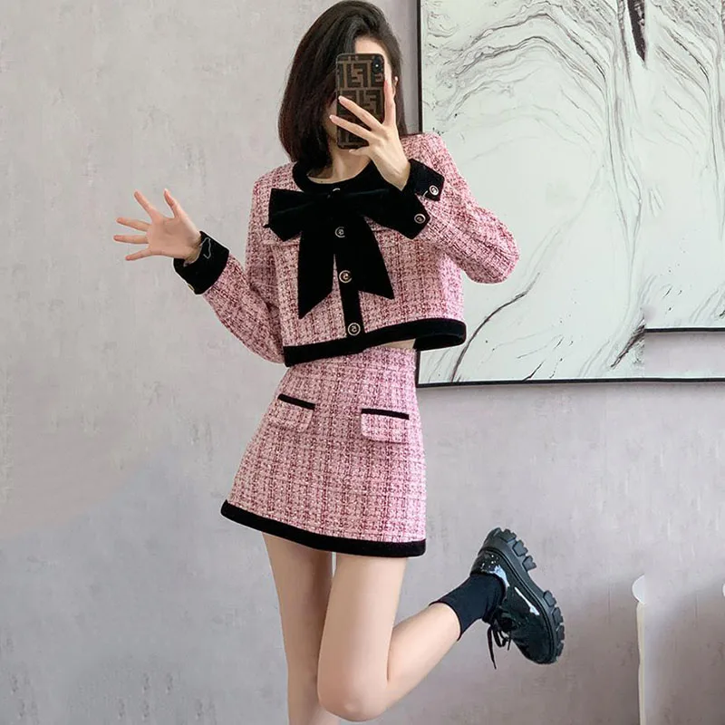 Женский офисный костюм из двух предметов розовая мини-юбка с бантом и короткая