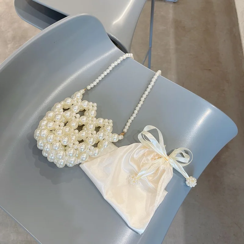 Popular Woven Bucket Holiday Portable Bead Bag Handmade Pearl Bag Female Pearl Chain Handbags for Women 2022Designer Luxury
