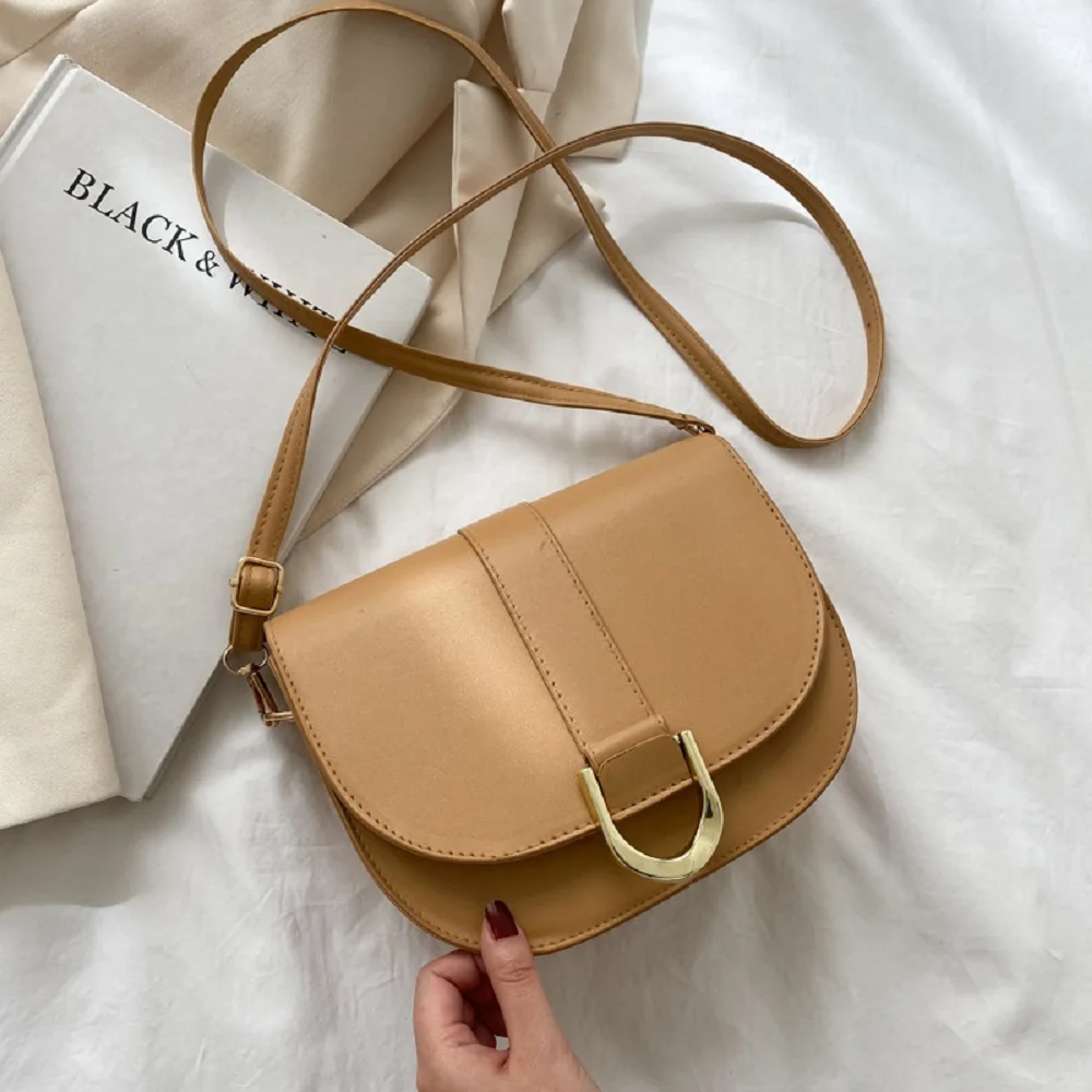

Solid Color Saddle Bag Horseshoe Buckle Simple Small Bag Retro Texture Single Shoulder Personality Korean Style Cross Body Bag