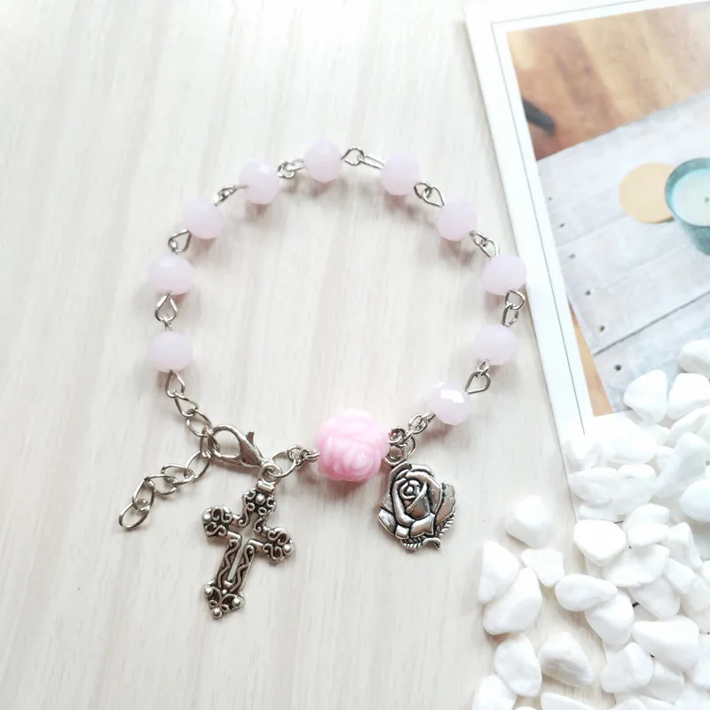 

Pink Crystal Strand Cross Rosary Bracelet Religious Jewelry