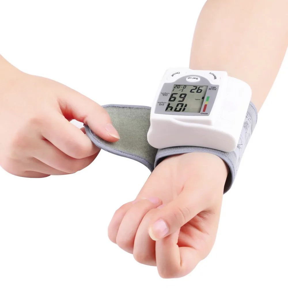 

Portable Automatic Digital LCD Display Wrist Blood Pressure Monitor Device Heart Beat Rate Pulse Meter Measure Tonometer White