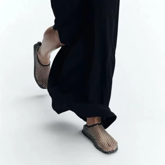 Женские босоножки на плоской подошве