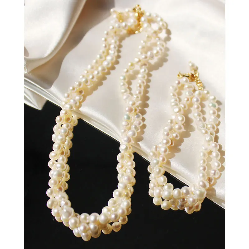 

Vacuum hand-wound double freshwater Rice pearl necklace retro twist clavicle chain bracelet