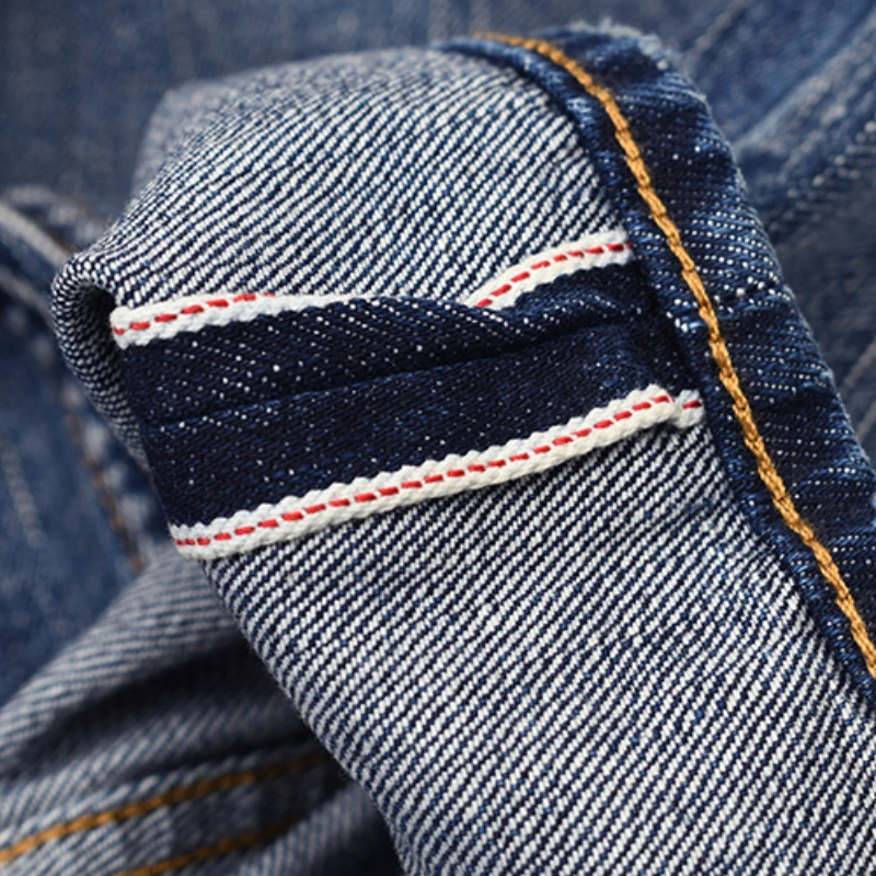 Red-eared Japanese-style retro jeans with old holes and heavy washing, loose straight micro-cone trousers.