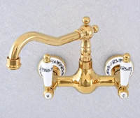 polished gold color brass bathroom kitchen sink basin faucet mixer tap swivel spout wall mounted dual ceramic handles msf611