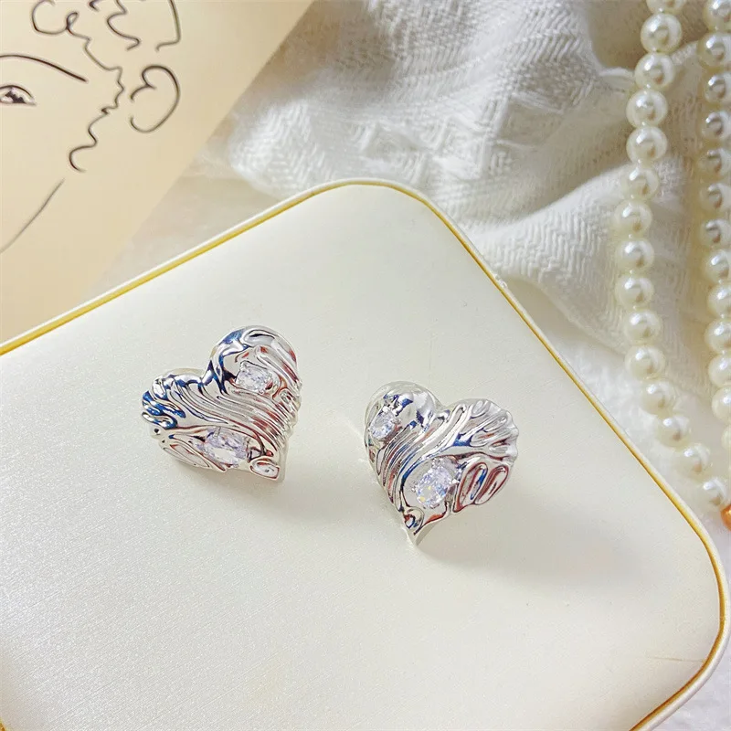 

2023 Korean Minority Design Retro Simple and Versatile Earrings Women Wrinkle Texture Alloy New Women's Earrings Wholesale